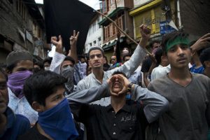 Kashmiri Muslim protesters shout slogans against India during a protest in Srinagar, Indian controlled Kashmir, Wednesday, Aug. 17, 2016. Curfew and protests have continued across the valley amidst outrage over the killing of a top rebel leader by Indian troops in early July, 2016. (AP Photo/Dar Yasin)