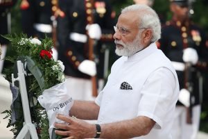 ARLINGTON, VA - JUNE 06: Indian Prime Minister Narendra Modi lays a wreath at the Tomb of the Unknown Soldier at Arlington National Cemetery, June 6, 2016 in Arlington, Virginia. The Prime Minister will meet with President Barack Obama on June 7.  (Photo by Mark Wilson/Getty Images)