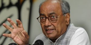 NEW DELHI, INDIA - MAY 22: Congress General Secretary and Rajya Sabha MP Digvijay Singh addressing a press conference after the completion of one year of Modi Government at AICC on May 22, 2015 in New Delhi, India. Targetting the one-year rule of Modi government, Congress General Secretary said that while the Prime Minister is busy 'beating drums' and 'playing violin' from Japan to Monglia, a grave agrarian crisis of unprecedented scale plagues the farm sector. (Photo by Sonu Mehta/Hindustan Times via Getty Images)